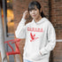 This hoodie celebrates the Canadian goose, wings spread wide, flying across Canada (and probably plotting its next lawn invasion).